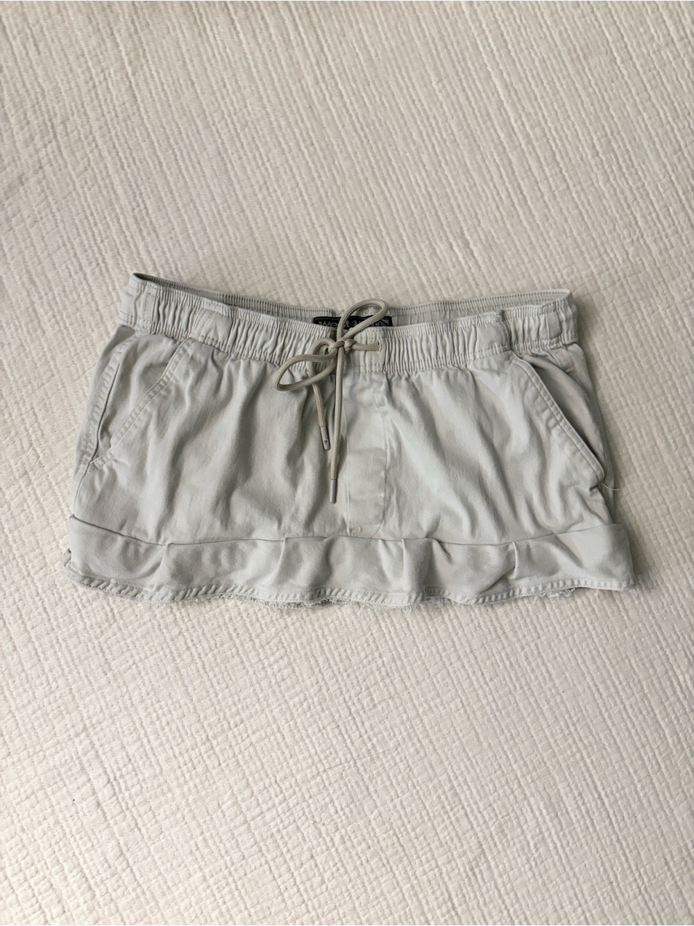 y2k cream cargo mini skirt distressed